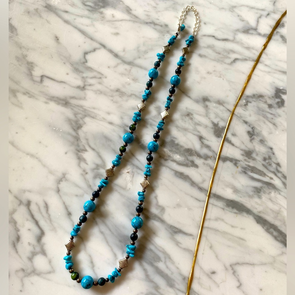 Turquoise beaded necklace.